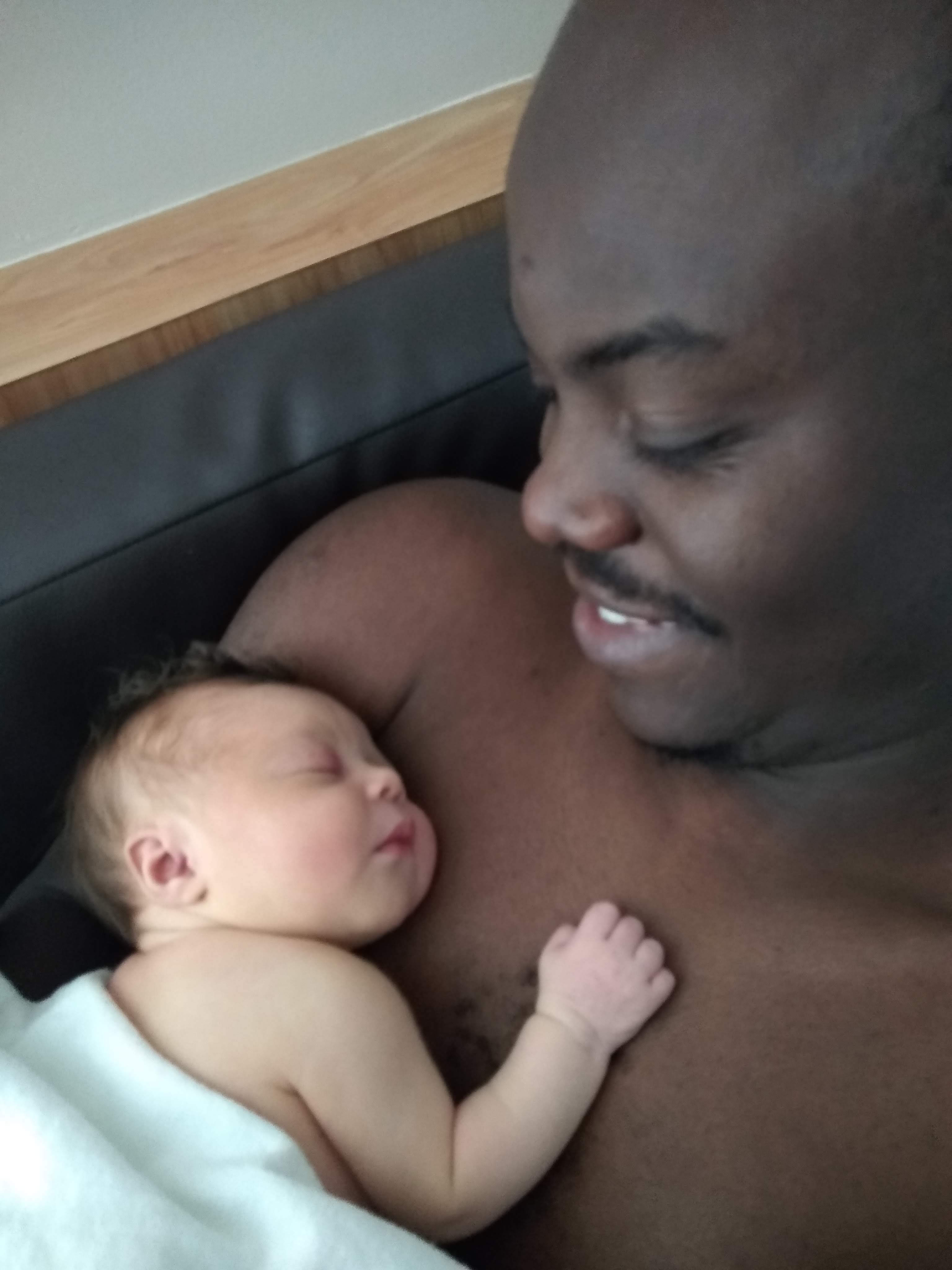 Yaw Nsiah with his newborn daughter